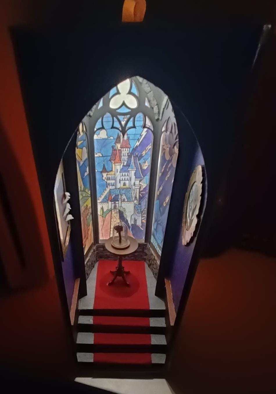 Beauty and the Beast handmade Book Nook with castle and rose details.