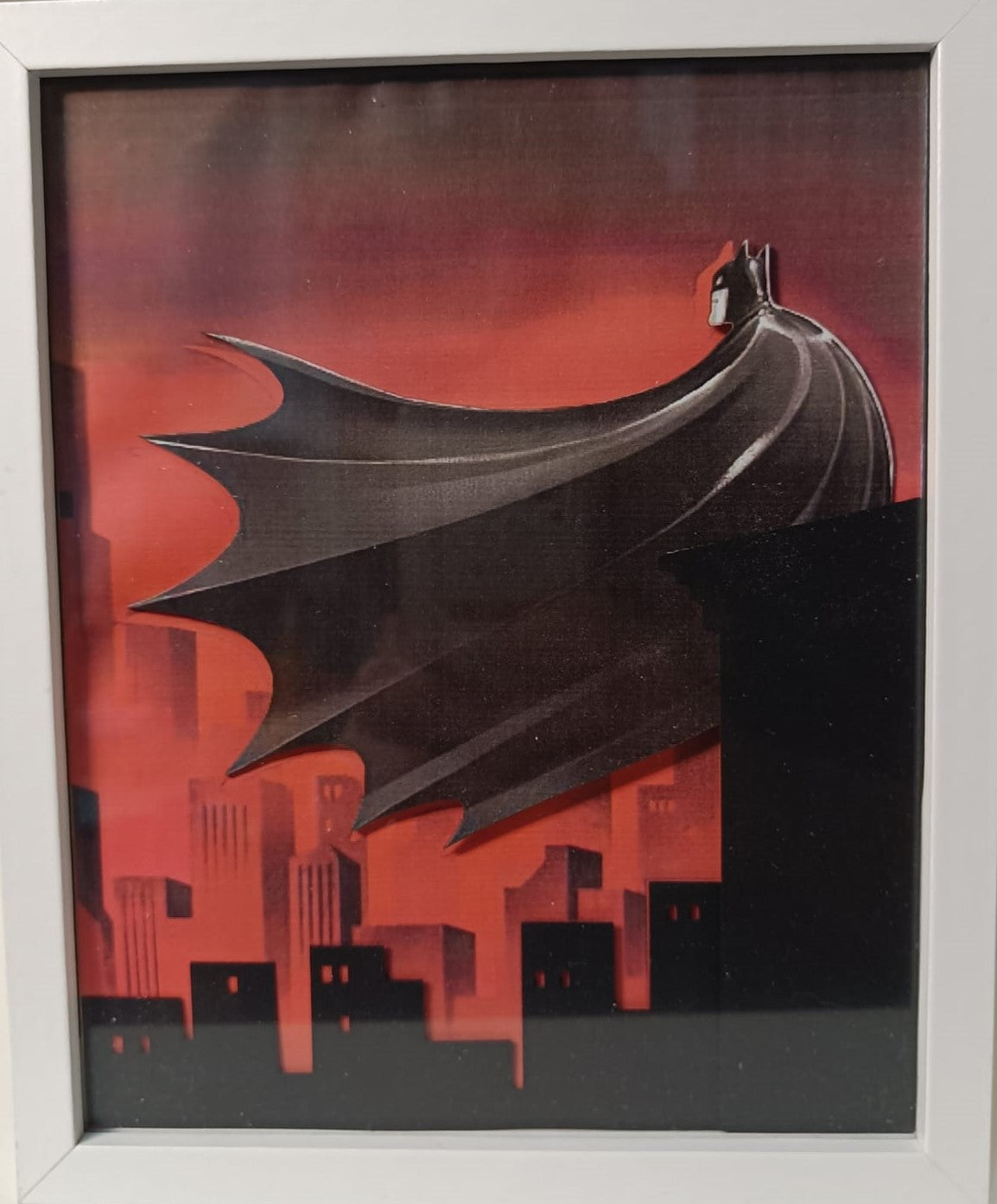 Cornice luminosa a tema Batman con Batsegnale magico.