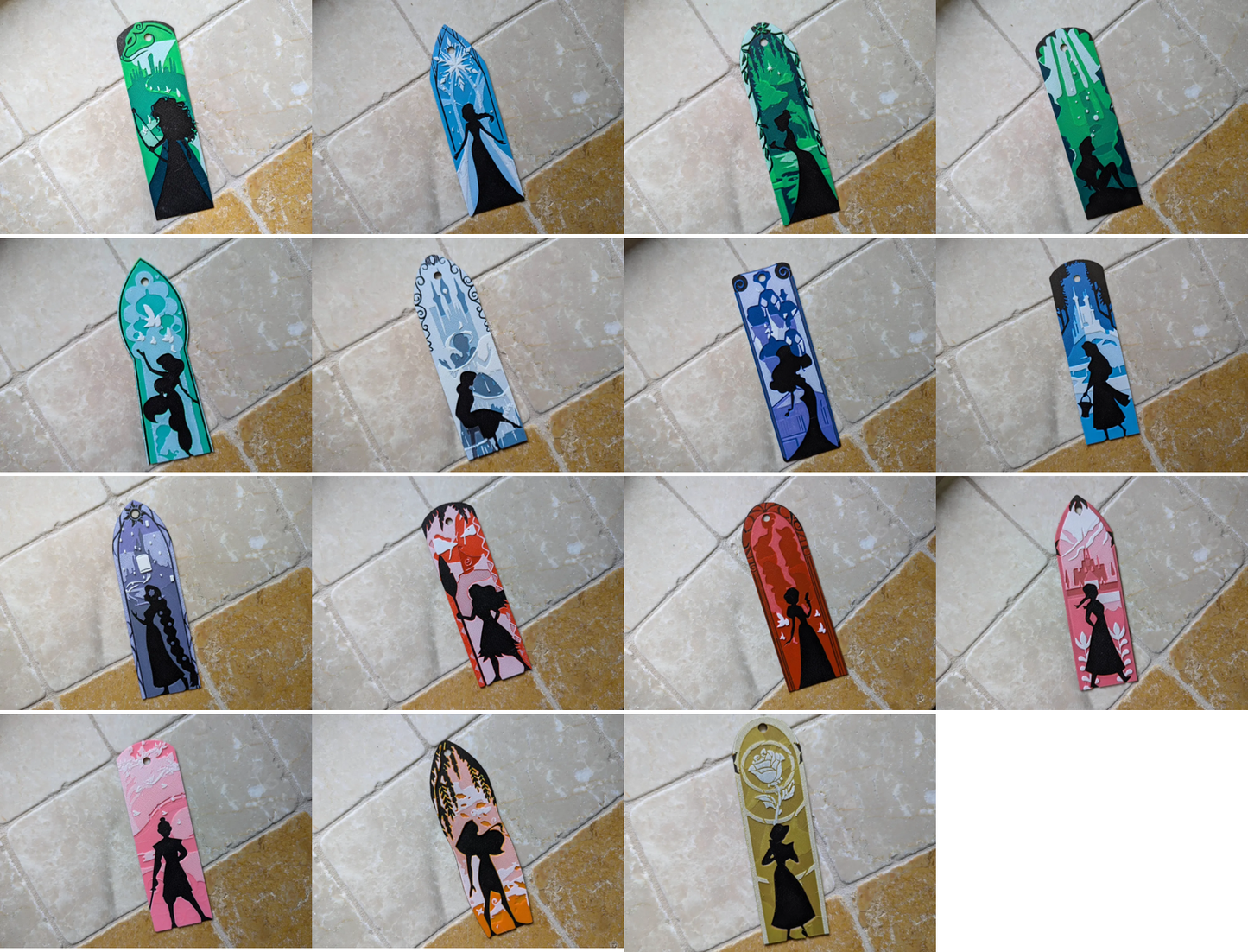 Collezione di segnalibri fantasy in PLA stampato in 3D ispirati alle principesse delle fiabe con silhouette e scenari decorativi colorati.